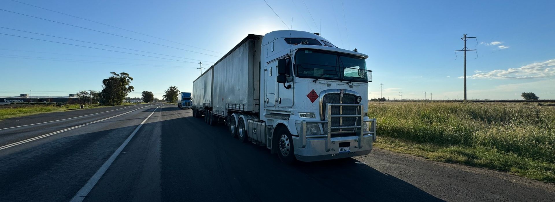 Prime mover on Australian highway at dusk